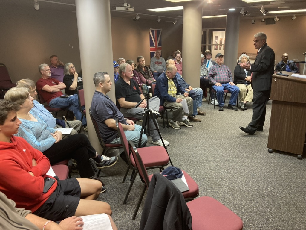 History teacher Mike Burgess speaks at the Relic Room in 2024 image